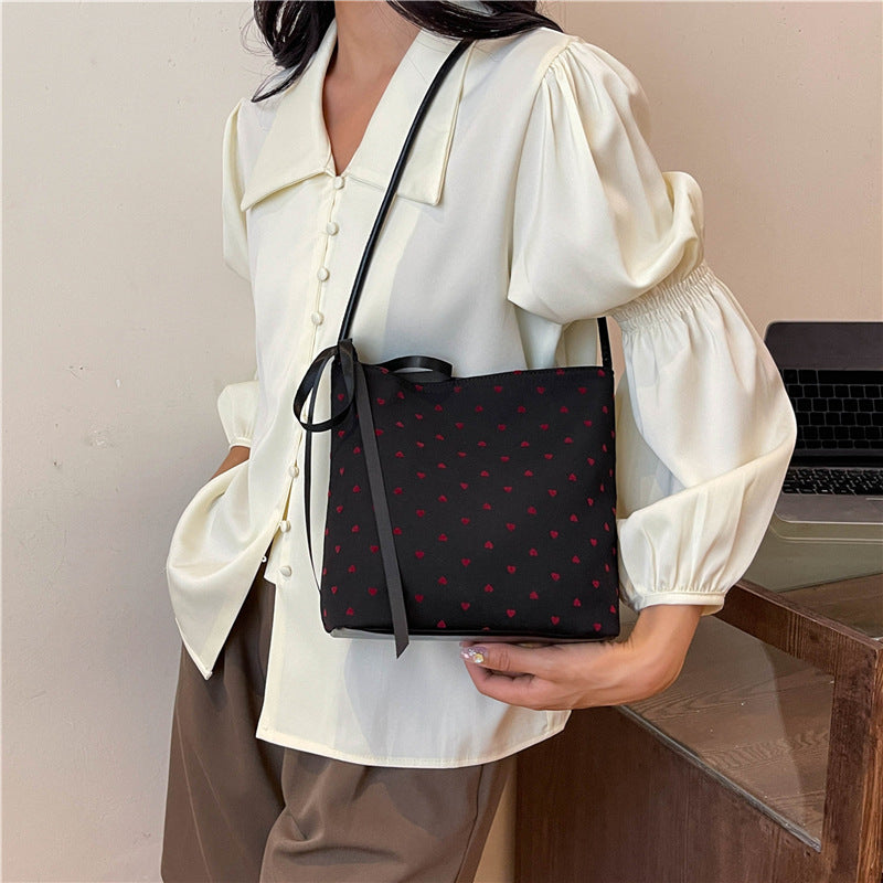 Canvas polka dot bag women's autumn 2025 new fashion commuter bow shoulder bag tote bucket women's bag