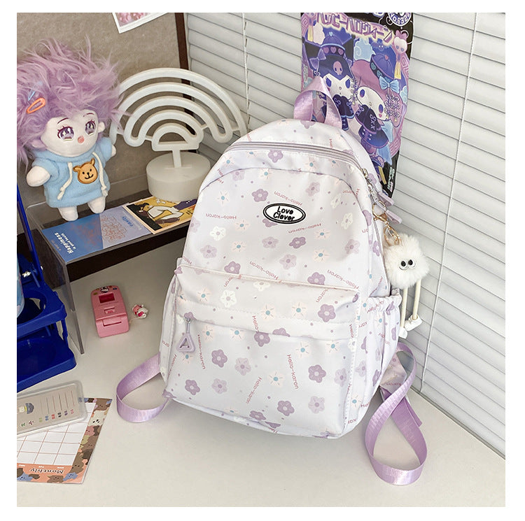 Niche original floral design schoolbag high value large capacity lightweight versatile backpack travel attendance backpack