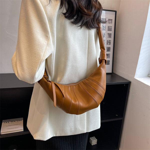 Niche design simple croissant 2025 new autumn texture croissant bag personalized trendy messenger bag women's dumpling bag
