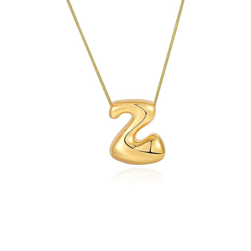 Amazon bestseller: premium bubble 26-letter gold pearlized necklace pendant - stylish women's accessory