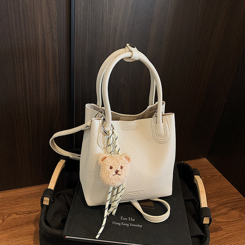 Casual fashion shoulder bag  new high-end simple commuter messenger bag Korean version niche versatile handbag