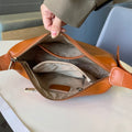 Genuine leather women's bag 2025 new fashion underarm dumpling bag retro commuter cowhide shoulder crossbody bag women's saddle bag