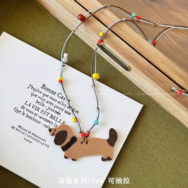Cute puppy pendant necklace, perfect for summer. a colorful dopamine necklace, long enough to wear with hoodies or as a skirt accessory