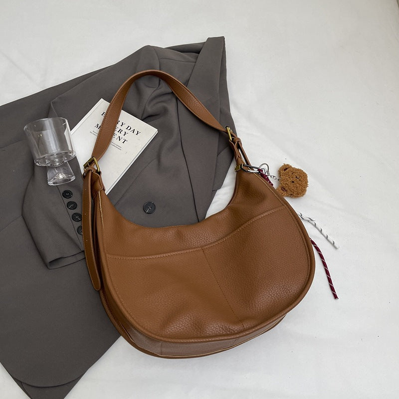 Autumn Internet celebrity explosion 2025 Korean version of the new fashion Mori dumpling bag simple and versatile casual messenger shoulder bag