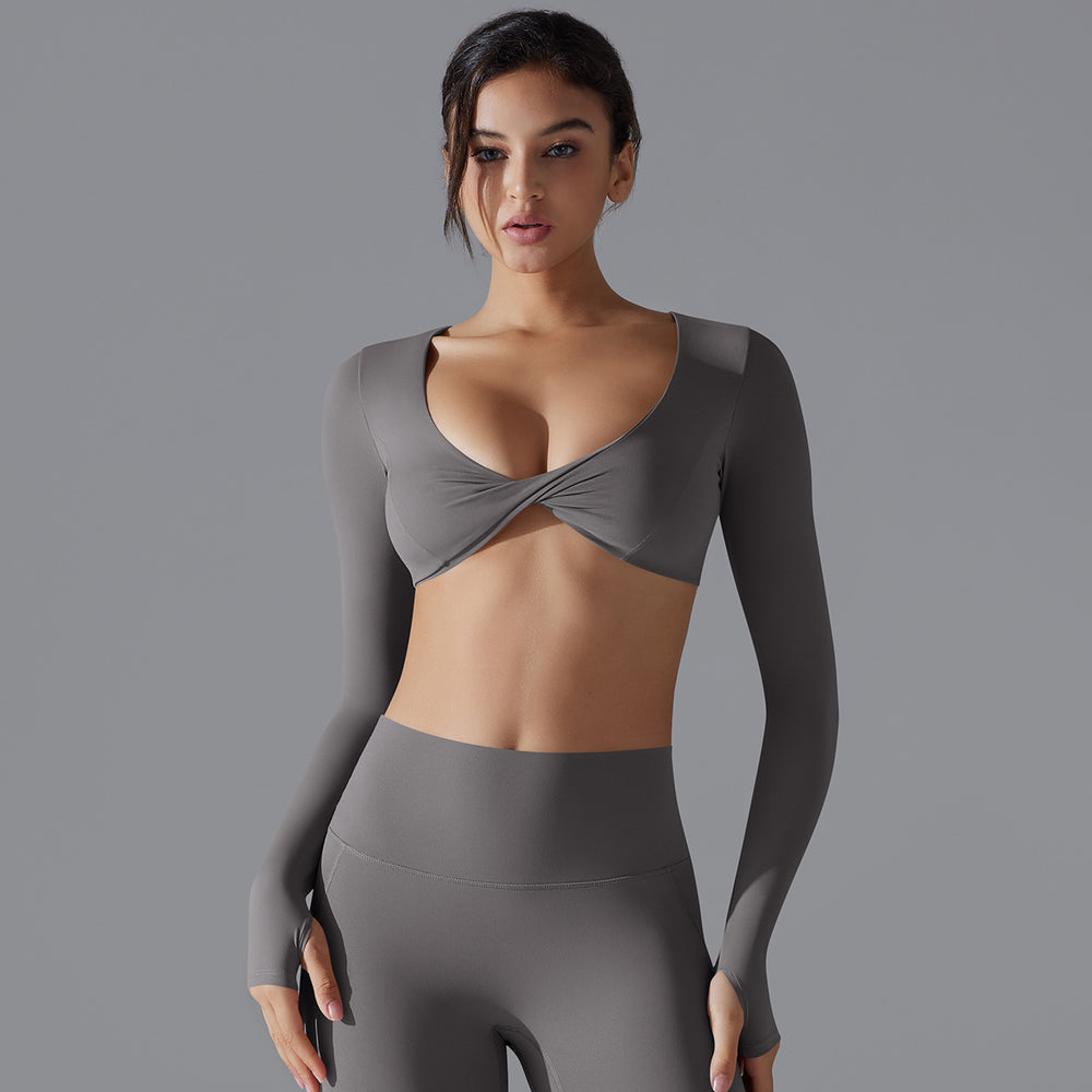 New women's activewear long sleeve top: deep v-neck, slim fit, breathable, trendy cropped yoga top for outdoor workouts