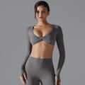 New women's activewear long sleeve top: deep v-neck, slim fit, breathable, trendy cropped yoga top for outdoor workouts