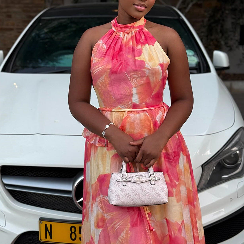 European and american cross-border women's fashion  autumn/winter new arrival: elegant printed backless tie-up sleeveless top and midi skirt set