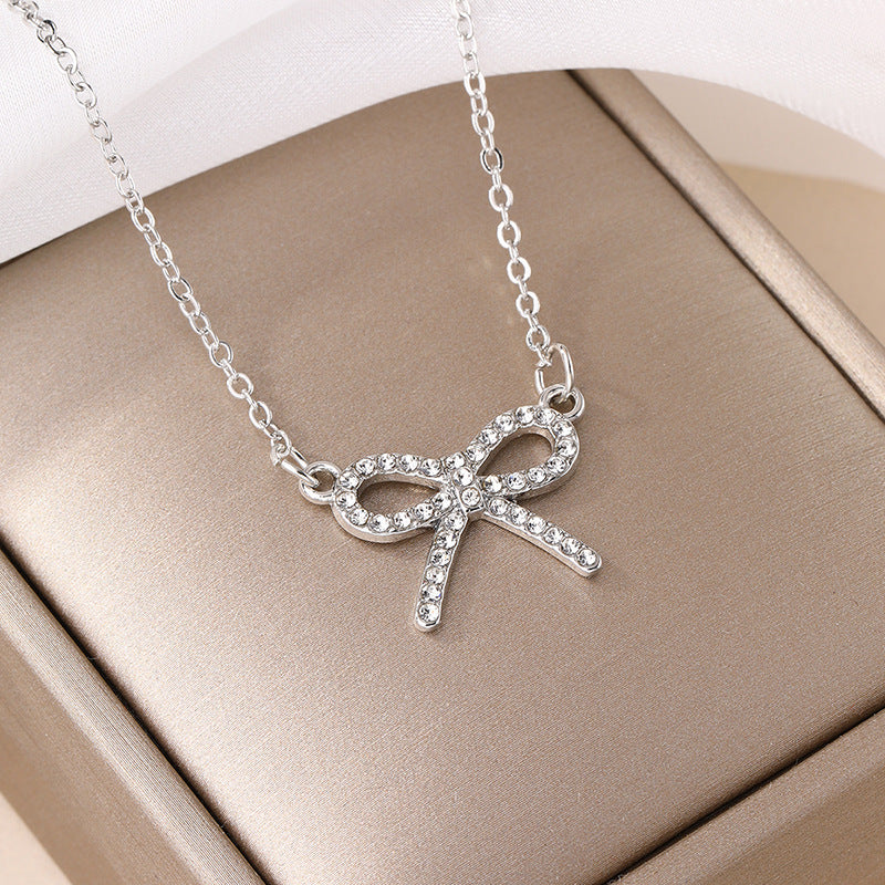 Wholesale bowknot necklaces - european & american cross-border jewelry - minimalist fashion pendants - women's alloy diamond-studded chokers & sweater chains