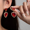 European and american hot-selling fashionable heart earrings - lightweight luxury, high-end, full diamond heart-shaped gemstone sweet and elegant earrings for women