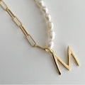 Elegant and chic: freshwater pearl necklace for moms - 26 letter titanium steel gold-plated pendant choker