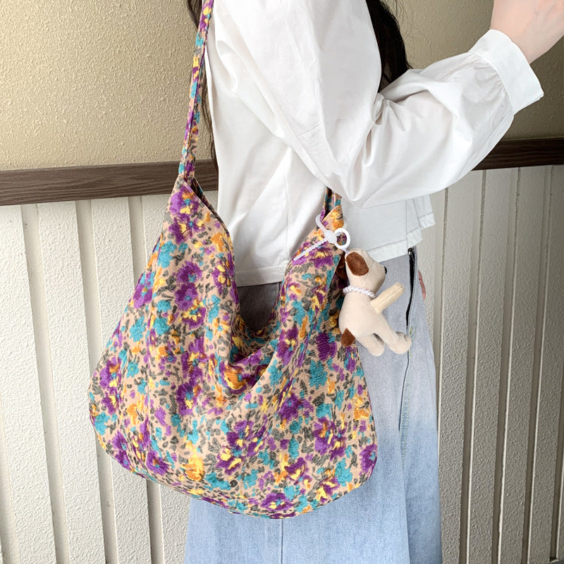 Cross-border new broken flower canvas bag messenger bag shopping bag fashion trend large capacity casual versatile women's shoulder bag