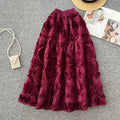 French chic floral midi skirt - high-waisted, slimming a-line design for women's spring collection