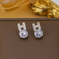 Er-8 silver letter h earrings