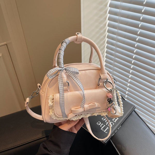 Premium sense niche bow bag women's summer 2025 new fashion portable bowling bag versatile messenger bag
