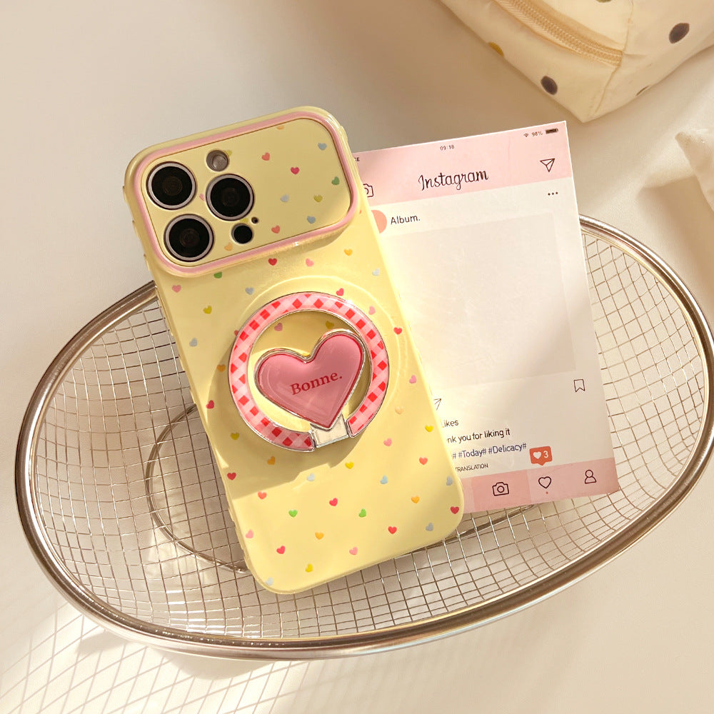 Trendy, custard-yellow iphone 17 case with a full-color heart design and stand. available in contrasting color iphone 18 soft case styles