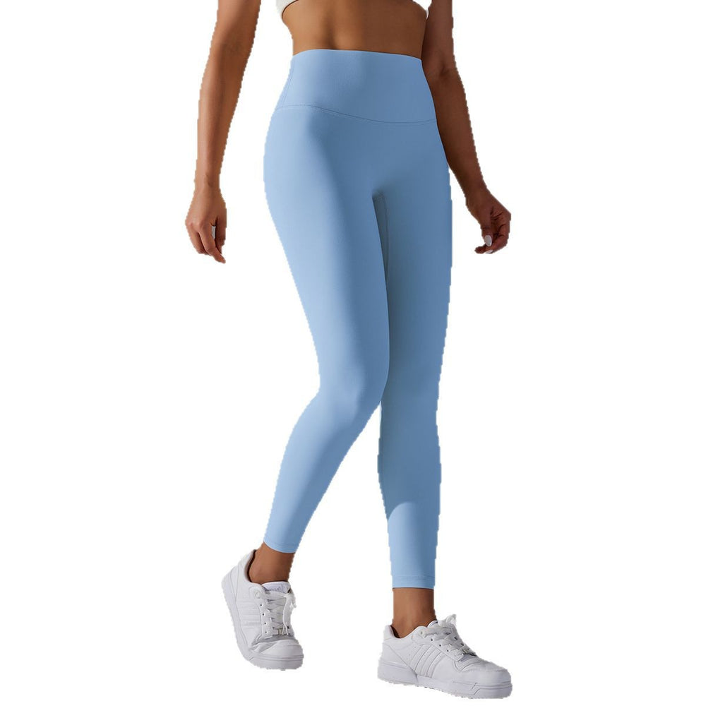 High-waisted, barely-there yoga pants for women, designed with a no-ride-up waistband for a seamless look. these figure-hugging, peach-shaped leggings offer a lift and a comfortable, stretchy fit, perfect for workouts and fitness activities. custom manufa