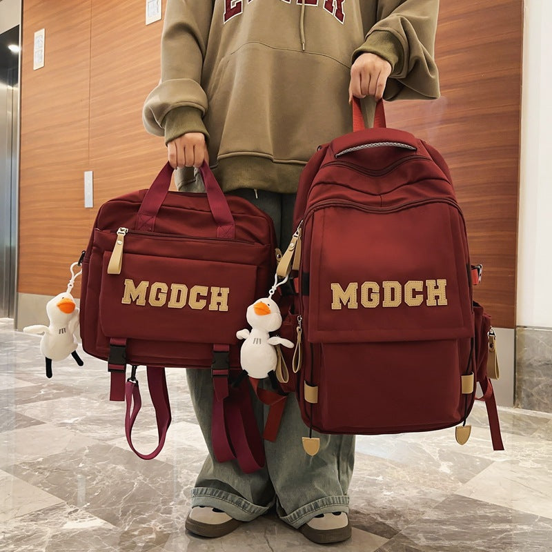 School bag women's new large-capacity backpack crossbody bag men's junior high school high school burden reduction primary school students diagonal span bag