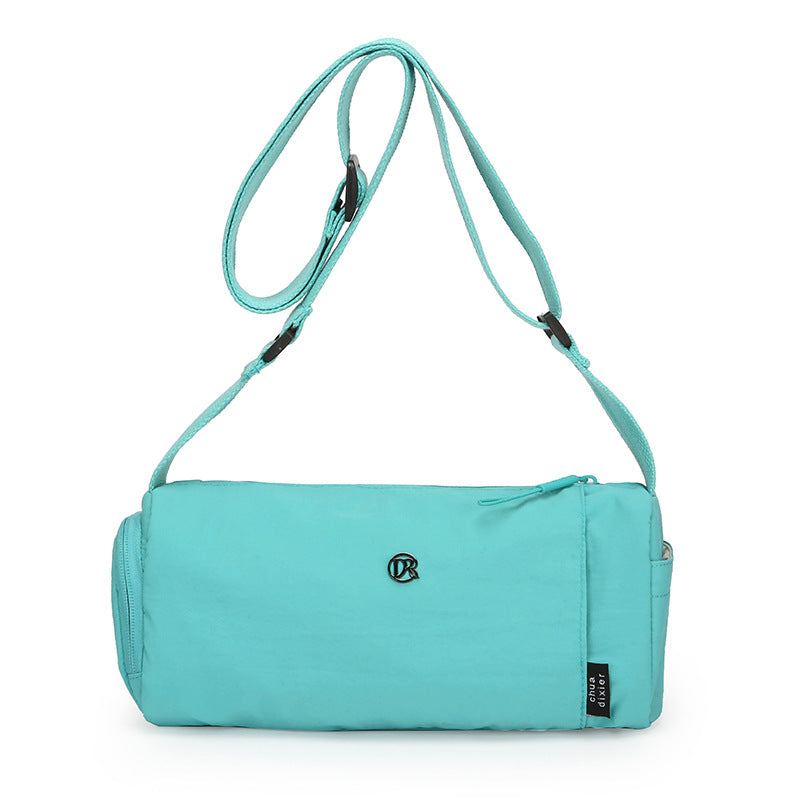 Simple Japanese shoulder bag women's nylon anti-splashing cylinder pillow bag trendy cool messenger bag commuter portable handbag