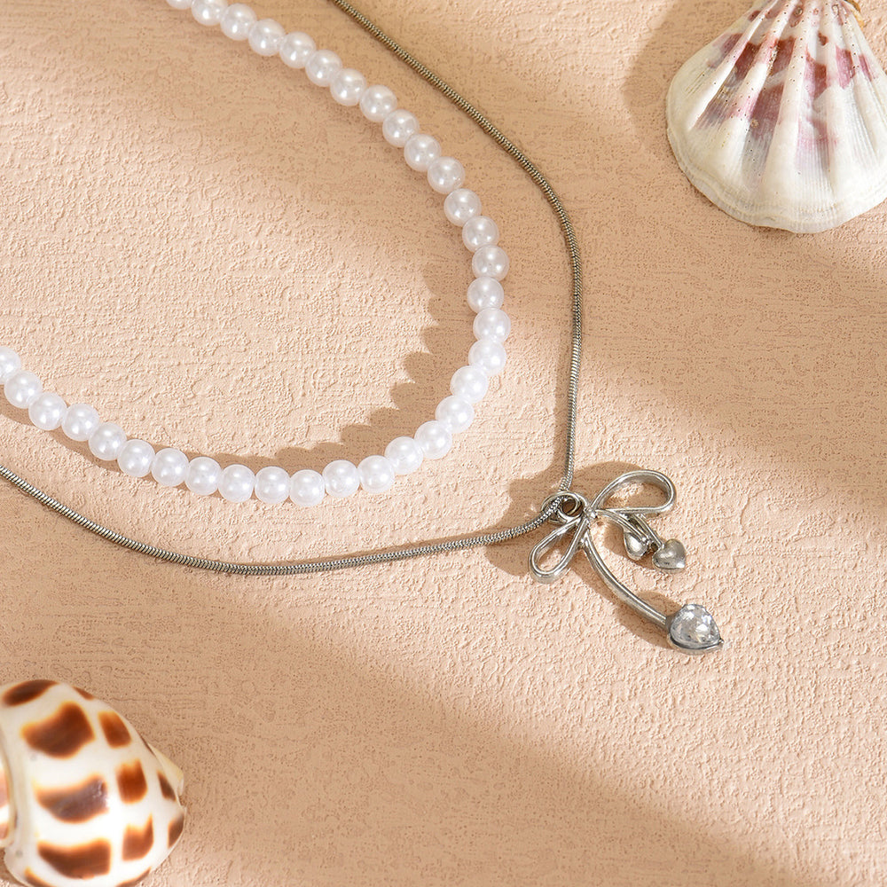 French style stacked pearl necklace wholesale european and american cross-border retro necklace accessible luxury high-end bow clavicle chain for women