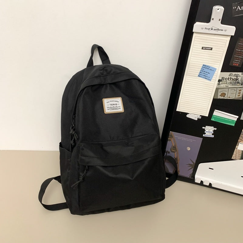 New fashion simple trend backpack large capacity lightweight travel backpack Korean version of junior high school student schoolbag