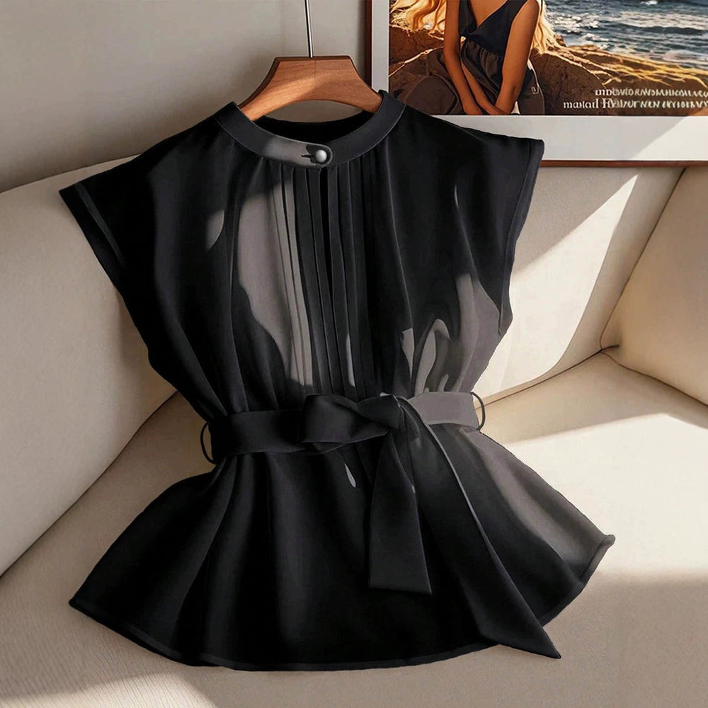 plus size french sleeveless top with stand collar, single button, chest pleat, tie waist, semi-sheer and flowy