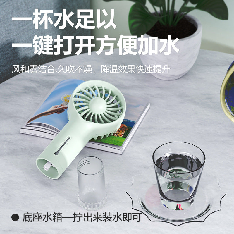 new arrival: outdoor handheld spray fan - multifunctional portable rechargeable humidifying mini fan gift