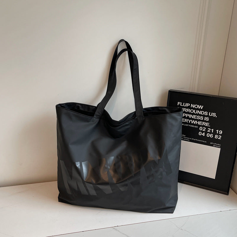 Cross-border college students take classes in tote bags 2025 summer new lazy style literary letter shoulder bags daily commuting bags