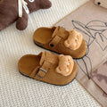 Cute and cuddly birkenstock-inspired slippers for kids, perfect for spring and autumn wear. these closed-toe, half-slippers feature a soft, comfortable sole and a slip-on design, making them ideal for lazy days