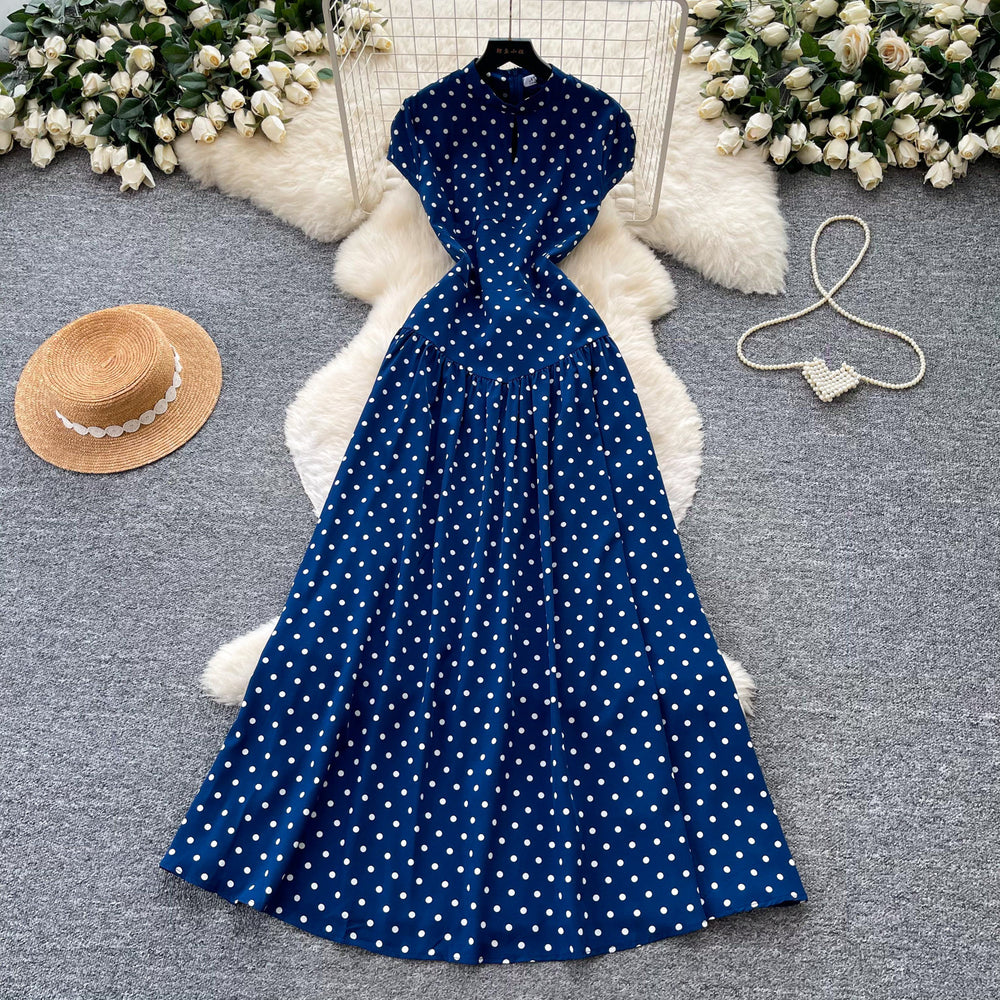 Vintage red short-sleeve polka dot dress - a versatile summer staple: high-waisted a-line, work-ready, slimming maxi dress
