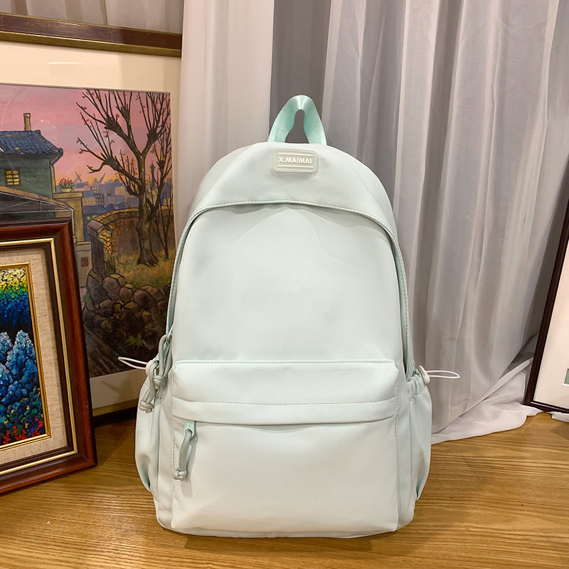Japanese-inspired, effortlessly chic backpack. new, sweet, solid-color design for elementary school students. a fresh, versatile, lightweight backpack perfect for school