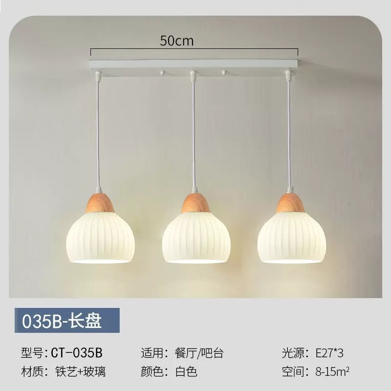 Modern minimalist dining room pendant light - creamy new style  - trending online - perfect for dining tables, bedrooms, studies, and bar counters - glass pendant lamp