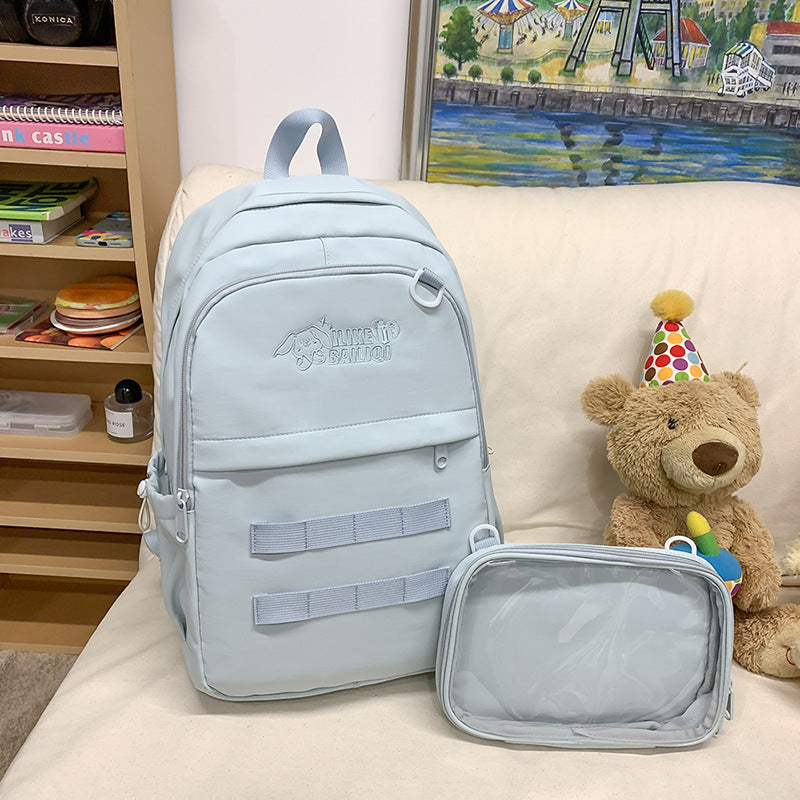 Solid color detachable badge personalized korean style high school student backpack large capacity minimalist versatile college student backpack