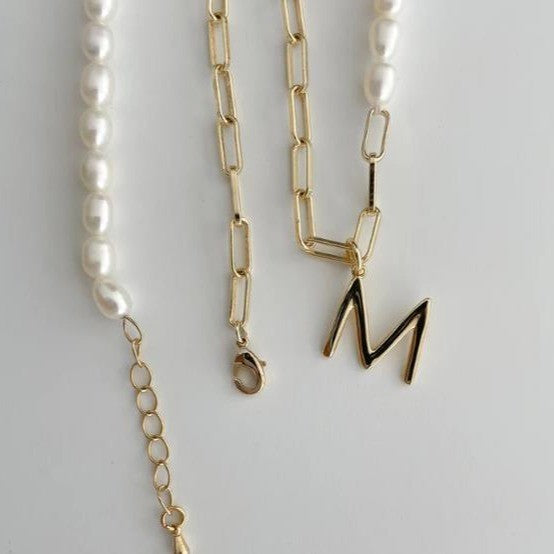 Elegant and chic: freshwater pearl necklace for moms - 26 letter titanium steel gold-plated pendant choker