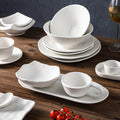 Minimalist blue and white polka dot ceramic bowls, plates, and dishes - perfect for home, restaurant, western cuisine, steak, high-end hotel, and unique dessert presentation
