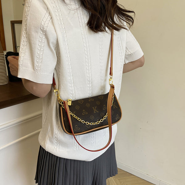 Women's bag French underarm bag French stick bag 2025 new fashion women's bag pendant shoulder crossbody small bag mobile phone bag