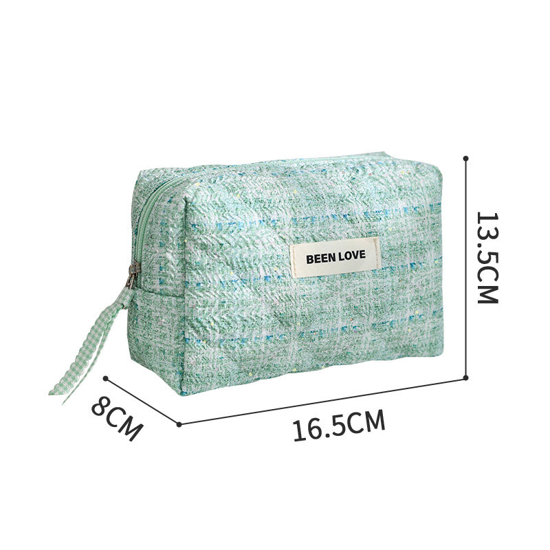 New hand-held cosmetic bag, portable high-value cosmetic storage bag, high-end toilet bag, women's mouth red envelope.