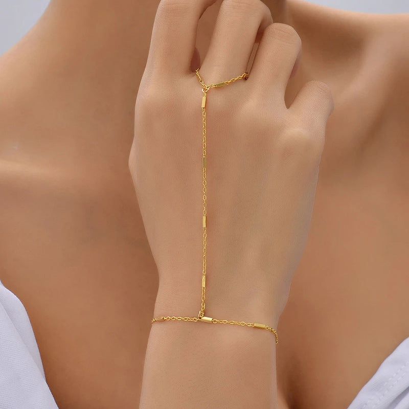 European and american new arrival versatile jewelry: minimalist white pearl bracelet, women's butterfly finger chain bracelet - wholesale from manufacturer