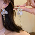 French romantic long floral tassel earrings - luxurious, elegant, and chic. a statement piece for the modern woman
