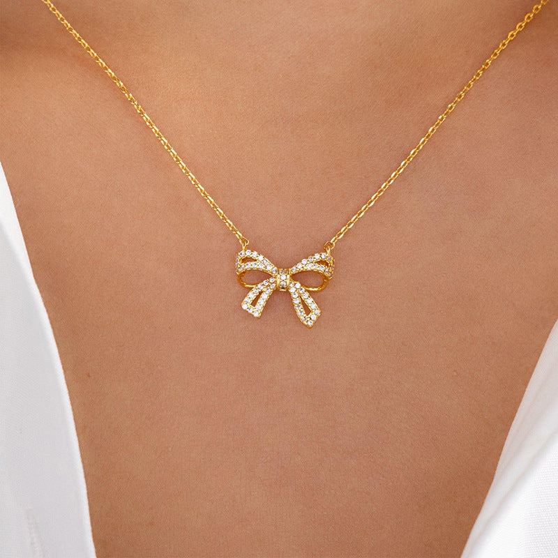 Wholesale bowknot necklaces - european & american cross-border jewelry - minimalist fashion pendants - women's alloy diamond-studded chokers & sweater chains