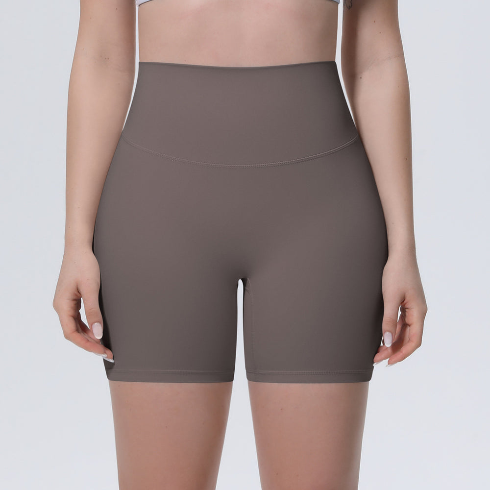 New arrival nude brushed quick-drying yoga pants women's high waist abdominal fitness shorts peach butt tight sports three-quarter pants