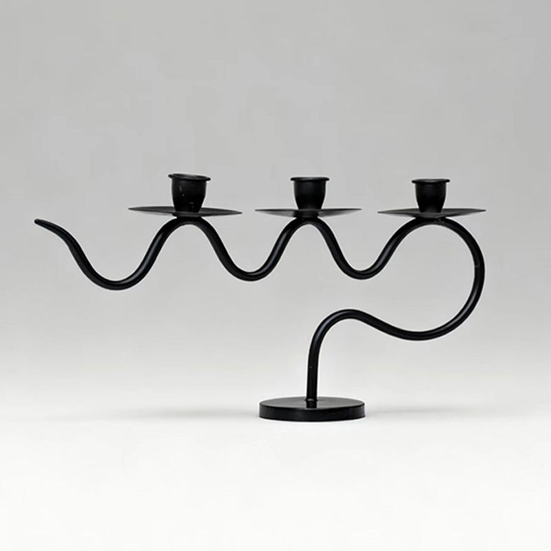 European retro minimalist wavy iron candle holder with electronic candles for a romantic ambiance in living room or dining table
