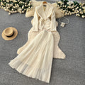 Elegant and chic chanel-inspired two-piece set: women's autumn outfit featuring a tie-waist cardigan and mesh skirt