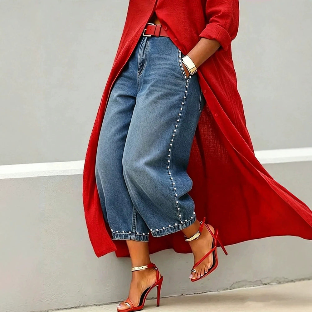 European and american style women's washed denim jeans with beaded side detailing, pearl embellished hem, vintage high-waisted wide leg jeans
