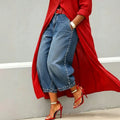 European and american style women's washed denim jeans with beaded side detailing, pearl embellished hem, vintage high-waisted wide leg jeans