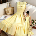 new european and american style cream yellow square neck sleeveless dress with pearl button detail, cinched waist, and pleated midi skirt