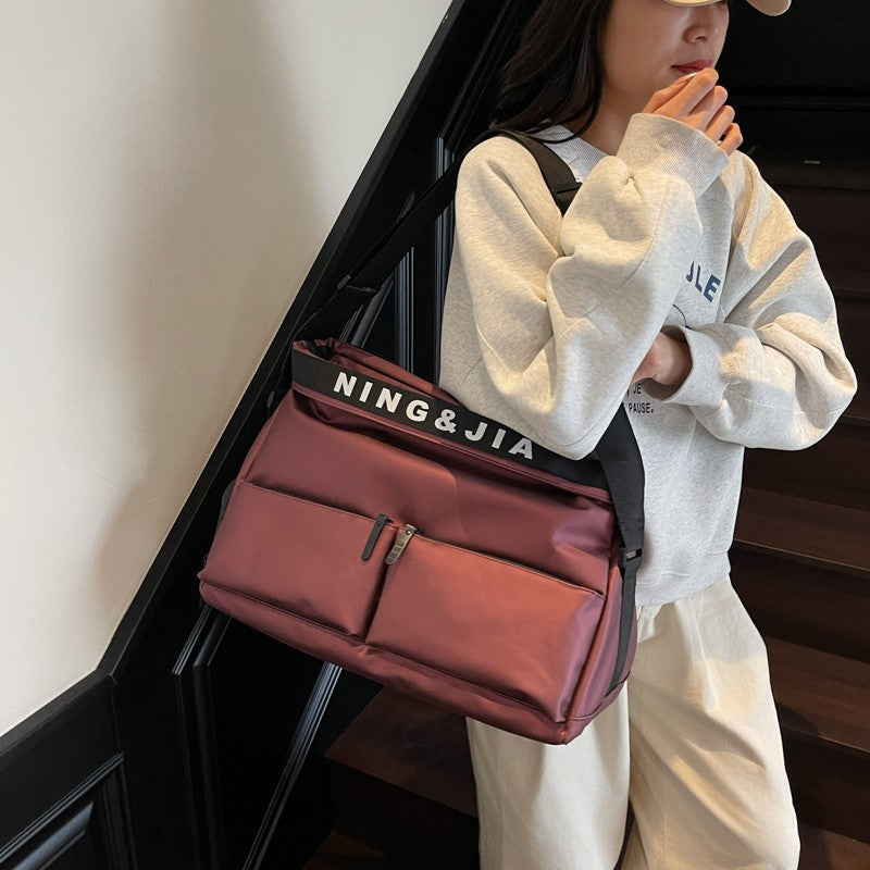Sports fitness bag, men's and women's fashion, hand-held travel bag, multi-pocket short-distance luggage bag, crossbody boarding bag wholesale