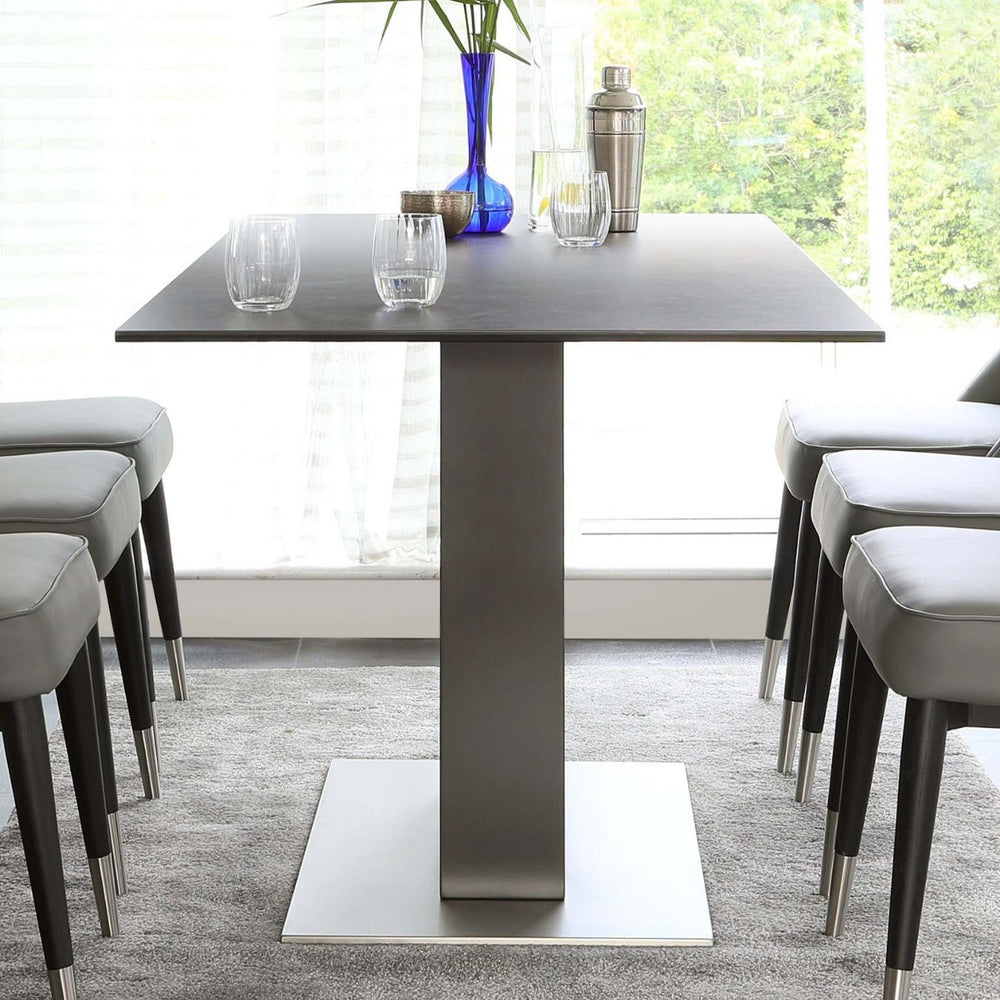 Tempered glass dining table - modern minimalist rock slab table with a touch of luxury