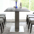 Tempered glass dining table - modern minimalist rock slab table with a touch of luxury