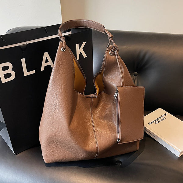 2025 new high-end soft leather shoulder tote bag large-capacity casual bucket lazy crossbody commuter armpit