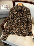 Luxury leopard print blouse with tie-waist, stand collar, and lantern sleeves - elegant workwear for women, 1688 source
